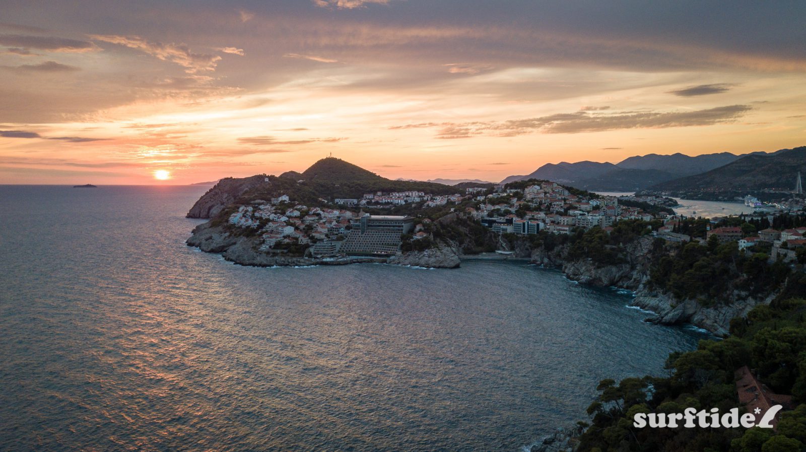 Aerial photo showing the sun setting over the sea in Dubrovnik southern Croatia