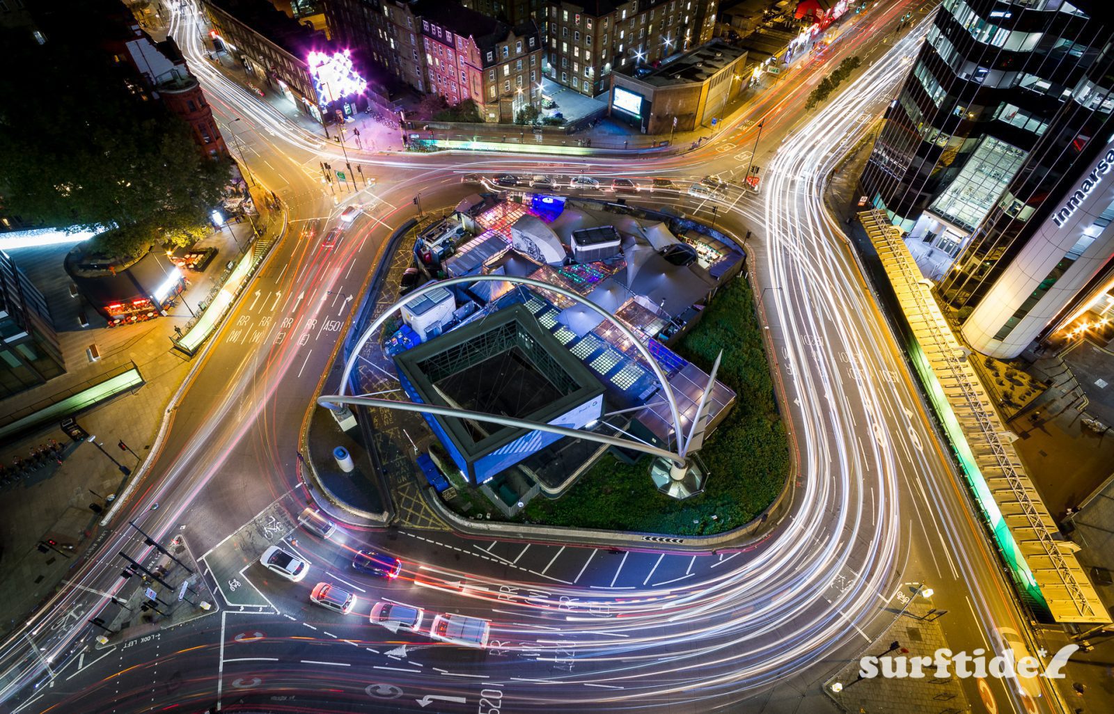 Long exposure aerial photo of the Old Street roundabout showing light trails from the passing traffic in London